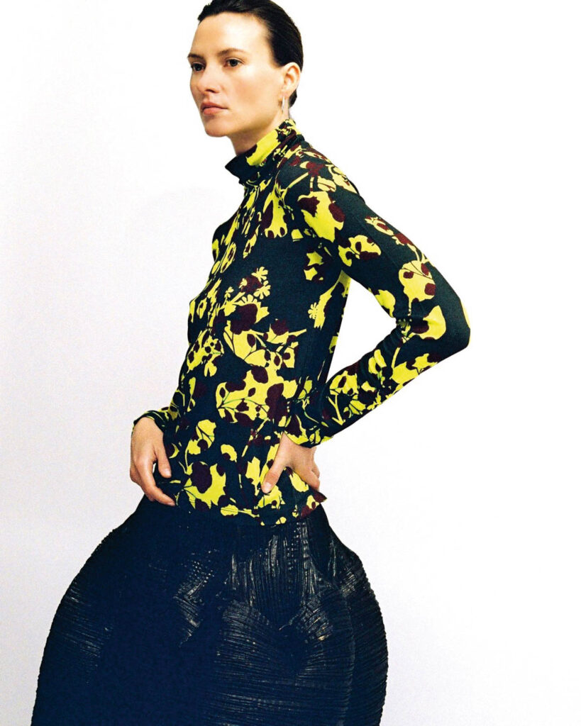 Ladies Drive No. 75. Julia Heuer fashion with signature hand-pleated textiles