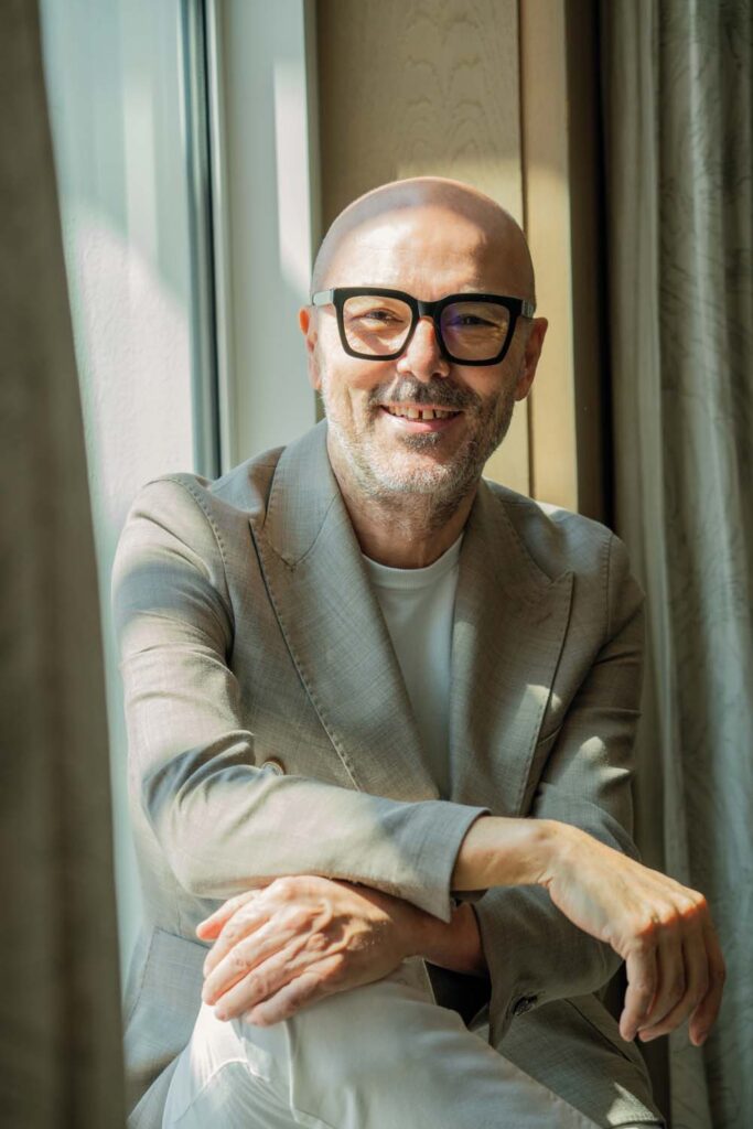 Portrait of Rossano Ferretti, Italian entrepreneur and founder of the global luxury hairdressing and haircare brand bearing his name.